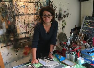Photograph of artist Mandy Payne in an artist's studio