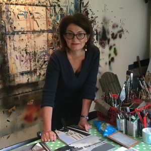 Photograph of artist Mandy Payne in an artist's studio