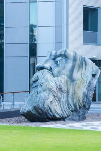 Photograph of an outdoor sculpture of the head of Friedrich Engels.