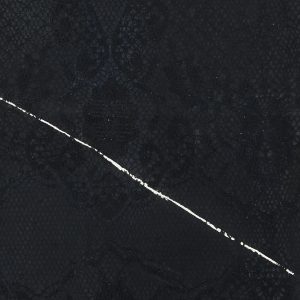 a close up image of a watercolour artwork. Dark blue black paint covers the image, with a faint pattern produced by a net curtain across it. A white slash or stripe draws across the square diagonally