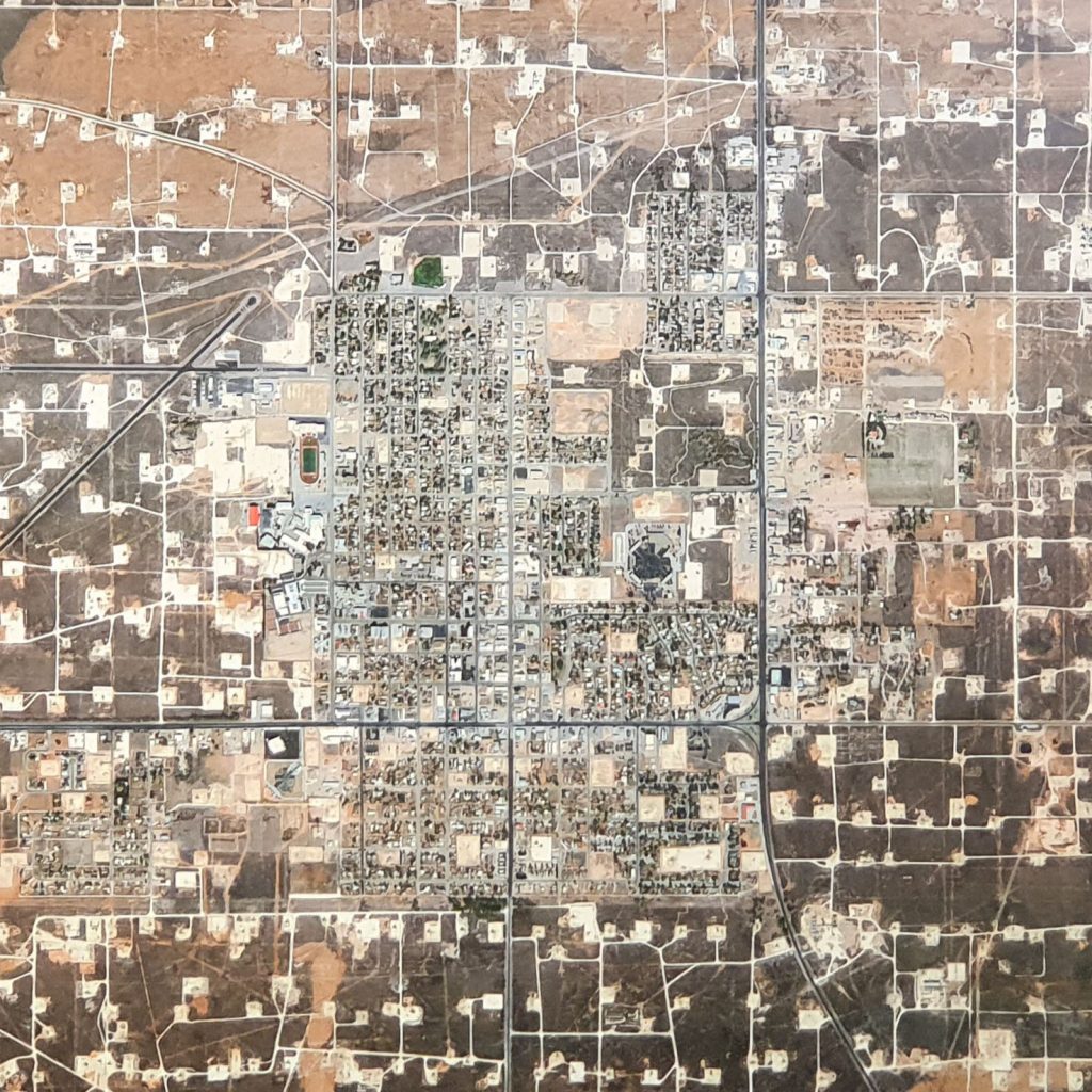 An close-up shot of Mishka Henner's "Wasson Oil and Gas Field, Yoakum County, Texas" in the 'Mediated Realities' exhibition in the New Adelphi Exhibition Gallery.